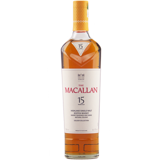 A bottle of The Macallan Colour Collection 15 Year Old Single Malt Scotch Whisky with a gold cap and label, displaying the distillery’s logo and age statement—celebrated for its notes of vanilla custard and oak.