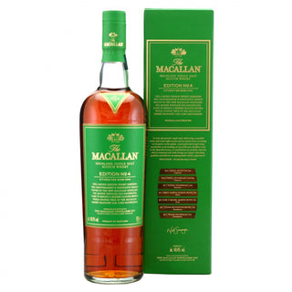 A bottle of The Macallan Edition No.4 Scotch whisky next to its green presentation box, shown on a plain white background.