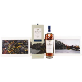 Macallan whiskey bottle with scenic cards on a white background