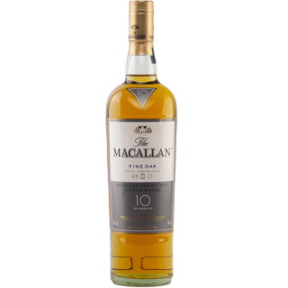 A bottle of The Macallan 10 Year Old Fine Oak Single Malt Scotch Whisky with a gold cap and detailed label, containing amber-hued whisky, is displayed against a plain white background.