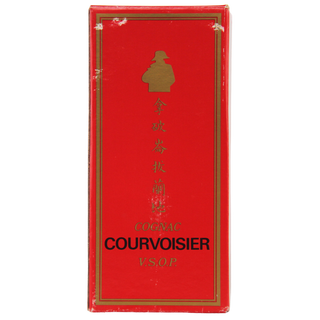 Red Courvoisier cognac box with gold accents on a white background