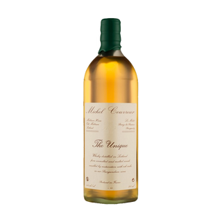 A bottle of Michel Couvreur The Unique French Whisky, sealed in green wax with a cream label in elegant cursive, reveals light amber spirit offering refreshing citrus zest notes.