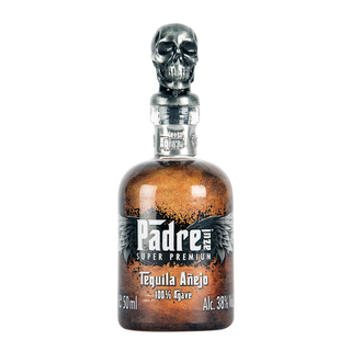 A 50ml bottle of Pādre Azul Super Premium Tequila Añejo, featuring a metallic skull cap and winged label. The brown bottle showcases smooth agave notes, with silver and white text indicating 100% agave and 38% alcohol.