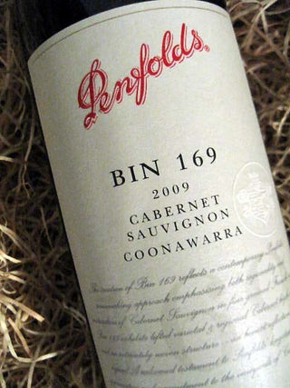 Penfolds Bin 169 2009 Cabernet Sauvignon Coonawarra wine bottle label on straw background