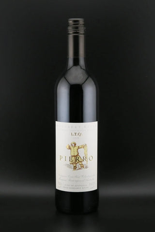 A bottle of Pietro wine with a white label featuring a gold illustration of a man holding a wine glass, set against a dark black background.