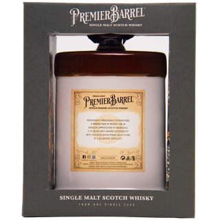 A Premier Barrel Caol Ila 8 Years Old Single Malt Scotch Whisky in a decorative box with a beige label, ornate gold text, and dark cap—partially visible through a clear window—showcases coastal freshness and briny minerality.