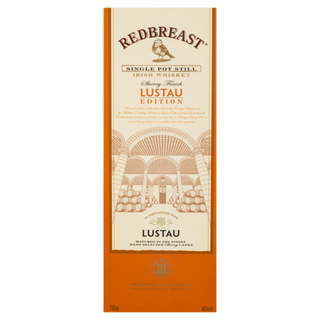 A rectangular white box of Redbreast Lustau Edition Single Pot Still Irish Whiskey features an orange border, gold and brown text, a winery illustration, and a bird above the brand name—hinting at its sherry cask influence.