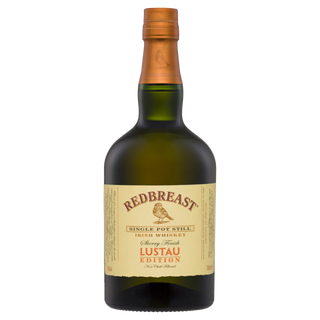 A bottle of Redbreast Lustau Edition Single Pot Still Irish Whiskey featuring a cream label, copper-colored cap, and notes of dark fruits from its sherry cask finish.