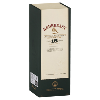 A rectangular box of Redbreast 15 Year Old Single Pot Still Irish Whiskey, in cream and dark green with gold accents and product details, suggests flavors of toasted oats and berry fruits.