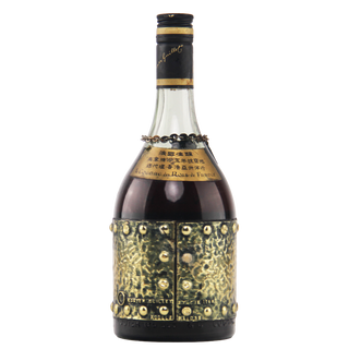 Decorative bottle with gold embellishments on a white background
