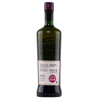 Green bottle with a label on a white background