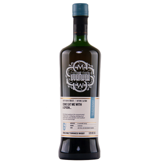 Whiskey bottle with label on a white background
