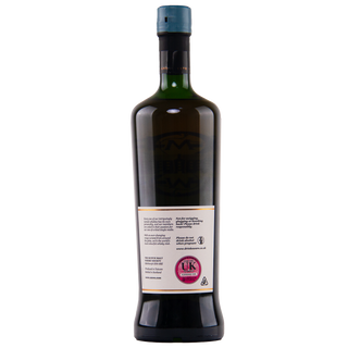 Bottle of dark liquid with a label on a white background