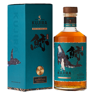 A bottle of Kujira Ryukyu 5 Year Old Japanese Whisky and its teal box, both adorned with a whale and Japanese text; aged 5 years in virgin white oak casks by Masahiro Shuzo, offering notes of spice and smooth caramel.