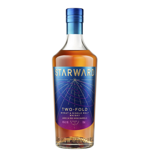 A bottle of Starward Two-Fold Australian Whisky with a blue and purple label, gold accents, and a blue cap. This amber whisky delivers notes of vanilla and red berries.
