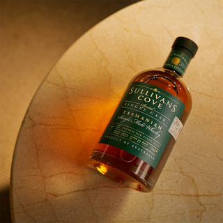 Bottle of Sullivan's Cove Tasmanian Single Malt Whisky on a textured surface