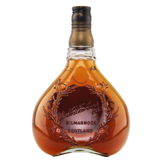 Bottle of Malton & Park whisky with a decorative label on a white background
