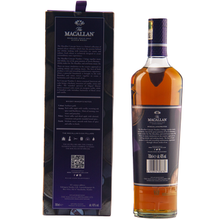 A bottle of The Macallan Concept Number 2 Single Malt Scotch Whisky stands beside its box, both adorned with purple and gold accents, featuring branded text and notes of warming oak spice on the packaging.