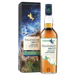 A bottle of Talisker Skye Single Malt Scotch Whisky stands by its box, adorned with ocean and rocky coast imagery. The bottle features a blue cap and white label with green and blue text, reflecting notes of light peat smoke and coastal brine.