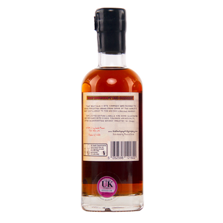 Bottle of whisky with a label on a white background