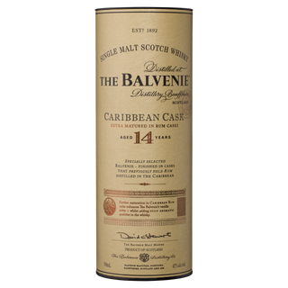 A beige and gold cylindrical box of The Balvenie Caribbean Cask 14 Year Old Single Malt Scotch Whisky features black and red text, highlighting Caribbean rum cask aging for tropical vanilla and toffee notes. Distillery details are included.