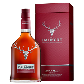 The Dalmore Cigar Malt Reserve Single Malt Scotch Whisky is displayed next to its red box, each adorned with a silver stag head logo and white text—crafted for the ultimate whisky and cigar pairing.