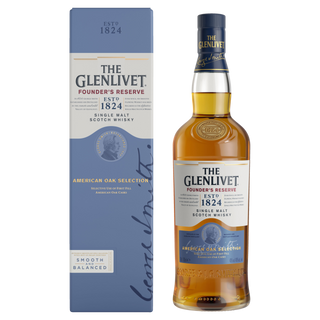 A bottle of The Glenlivet Founder’s Reserve Single Malt Scotch Whisky stands beside its blue box, both featuring gold, white, and blue labels with “American Oak Selection,” sweet malt notes, and George Smith’s signature.