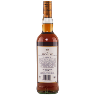 A bottle of The Macallan Archival Series Folio 7 Single Malt Whisky, shown from the back with a detailed label and copper-colored cap. Its amber brown spirit suggests notes of dried fruits and warm spices.