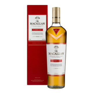 A bottle of The Macallan Classic Cut single malt whisky next to its red packaging box, shown on a plain white background.
