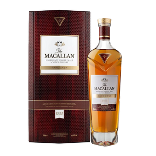 A bottle of The Macallan Rare Cask Single Malt Scotch Whisky (2022 Release) stands beside its maroon and gold box, featuring a textured pattern. The amber whisky offers notes of vanilla and sherry sweetness.