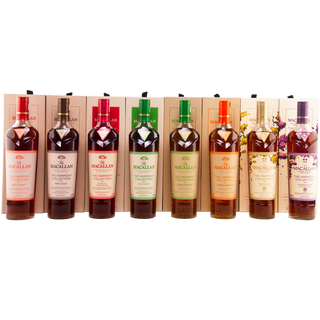 Collection of Macallan bottles displayed against a white background