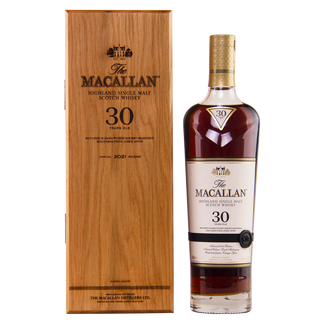 The Macallan 30-year-old whisky bottle and wooden box on a white background