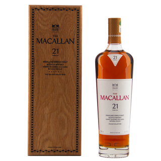 The Macallan 21-year-old whisky bottle and wooden box on a white background