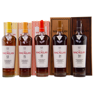 Collection of The Macallan whisky bottles and packaging on a white background