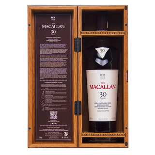 The Macallan 30-year-old whisky bottle in a wooden case with detailed label.