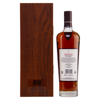 Bottle of Macallan whiskey with wooden box on a white background
