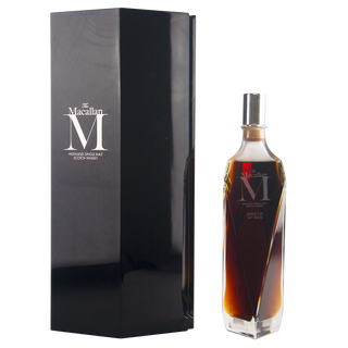 Macallan whisky bottle and packaging on a white background
