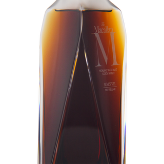 Macallan whiskey bottle on a white background