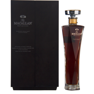 Macallan whiskey bottle and packaging on a white background