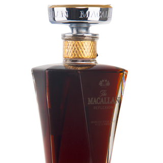 Macallan whiskey bottle on a white background