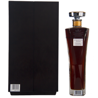 Bottle of Macallan whiskey with a black box on a white background