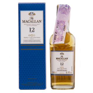 The Macallan 12-year-old whisky bottle and box on a white background