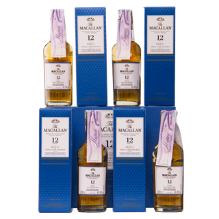 Five bottles of The Macallan 12-year-old whisky with blue boxes on a white background