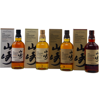 Four bottles of Yamazaki whisky with packaging on a white background