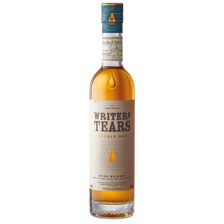 A bottle of Writers Tears Double Oak Irish Whiskey, featuring a beige label with gold and black text and a gold teardrop icon, stands upright against a plain white background.