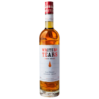 A bottle of Writers Tears Red Head Irish Whiskey, featuring a white label with red and gold accents and a red cap, filled with golden-brown liquid that hints at dried fruits, stands against a plain white background.