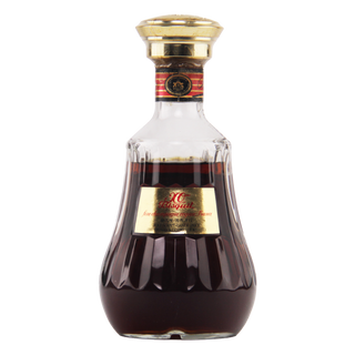 Bottle of X.O. Brandy with a gold cap and label on a white background