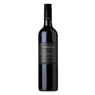 Wine bottle labeled 'Xanadu' on a white background