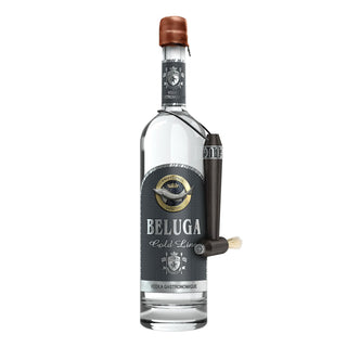 Beluga Gold Line Russian Vodka 1.5L features a textured dark label with gold accents, a small brush attached to the neck by a metal holder, and is sealed with brown wax, promising grain sweetness and a smooth, creamy profile.