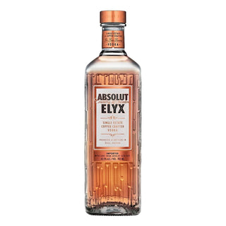 Absolut Elyx Vodka 700ml comes in a clear glass bottle with copper accents and an embossed pattern, showcasing its Single Estate Copper Crafted Vodka and ultra-smooth, creamy grain character.
